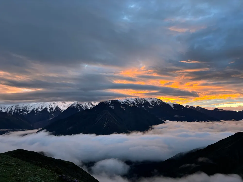Sunrise over the clouds near Mount Gongga